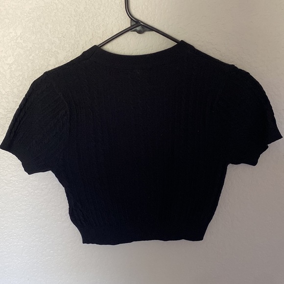 These tops are from fashion Q the black is a small and the tan is extra small. - Picture 4 of 8